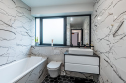 Rénovation de carreaux de carrelage d'un plan de travail d'une cuisine  