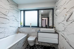 Rénovation de carreaux de carrelage d'un plan de travail d'une cuisine  